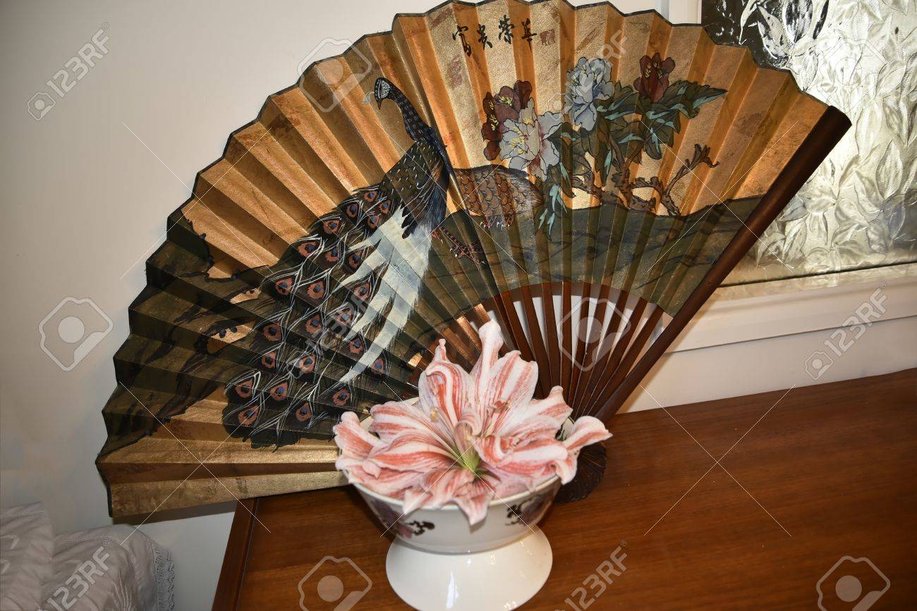 Still Life with Amaryllis flower and a Chinese Peacock Fan