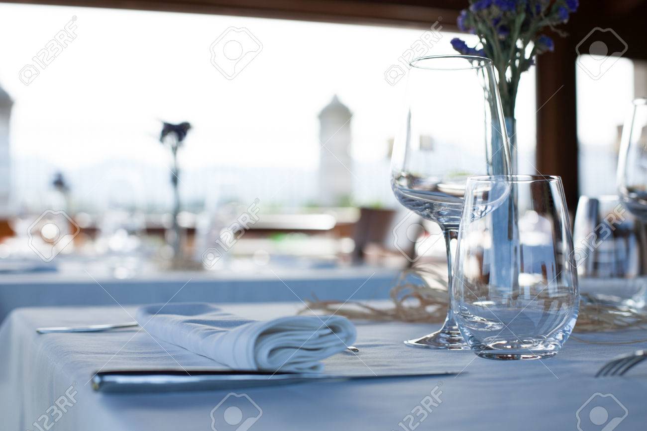 Lonely Table In Elegant Luxury Restaurant Interior With White