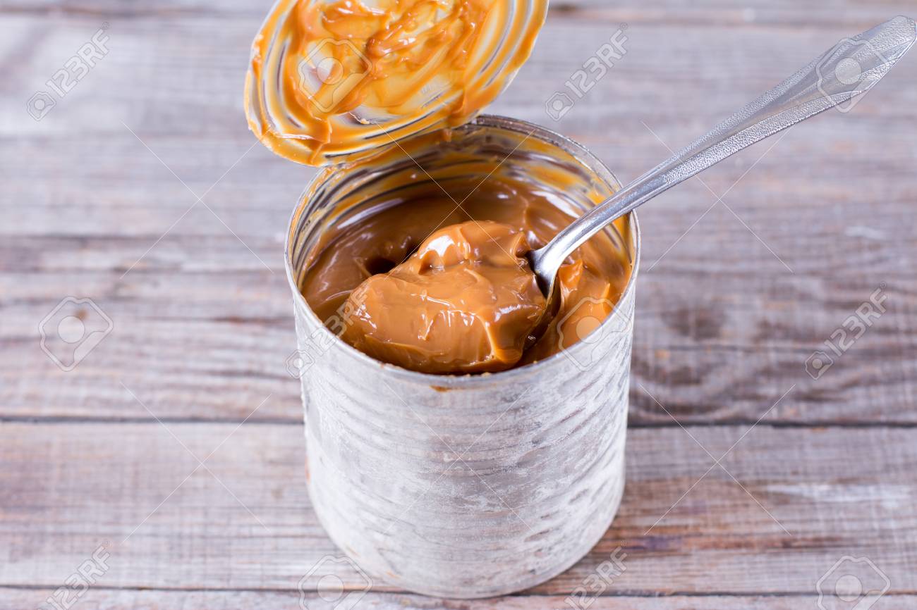 Bank Boiled Condensed Milk On A Wooden Table Stock Photo Picture And Royalty Free Image Image 98865461