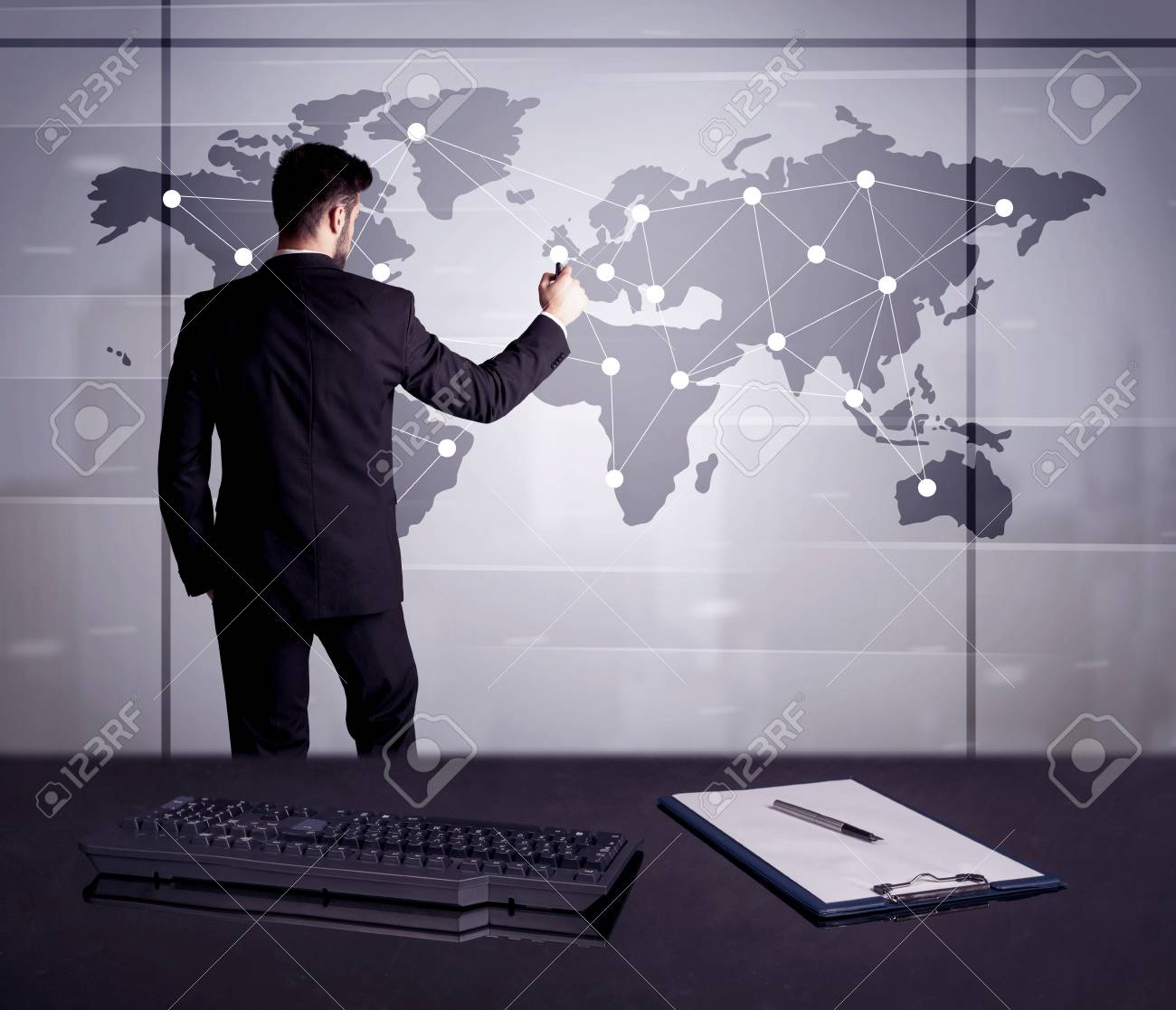 a young office worker drawing on world map and connecting dots office world map