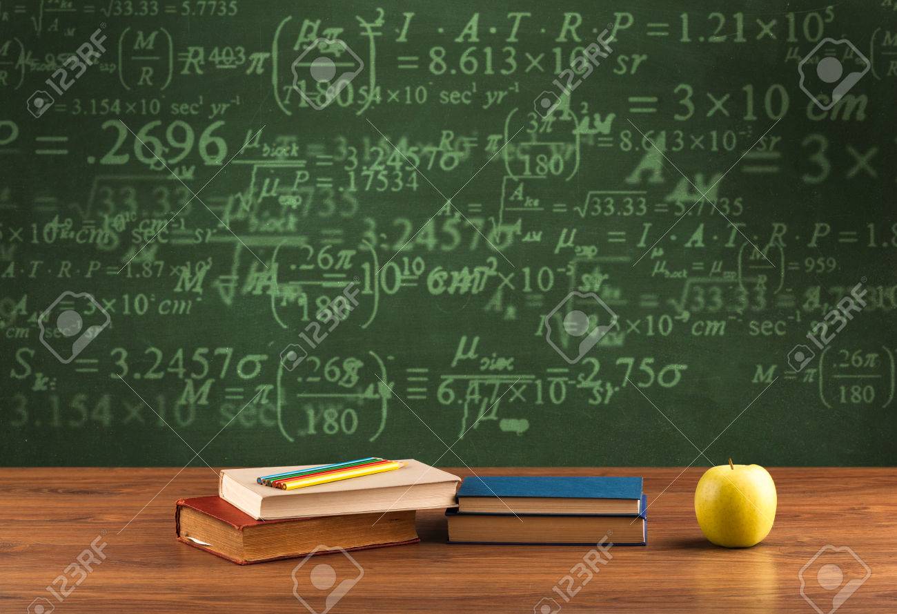A Stuffed School Desk With Green Blackboard In The Background Full Of  Numbers, Calculation Stock Photo, Picture and Royalty Free Image. Image  59243447., image size:1300x889