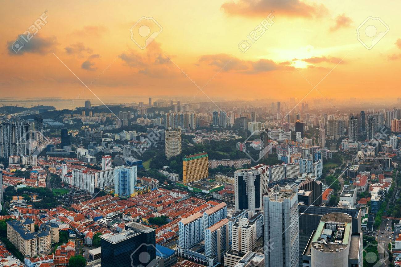 Singapore rooftop view with urban skyscrapers at sunset. - 46849184 Singapore rooftop view with urban skyscrapers at sunset. - 46849184