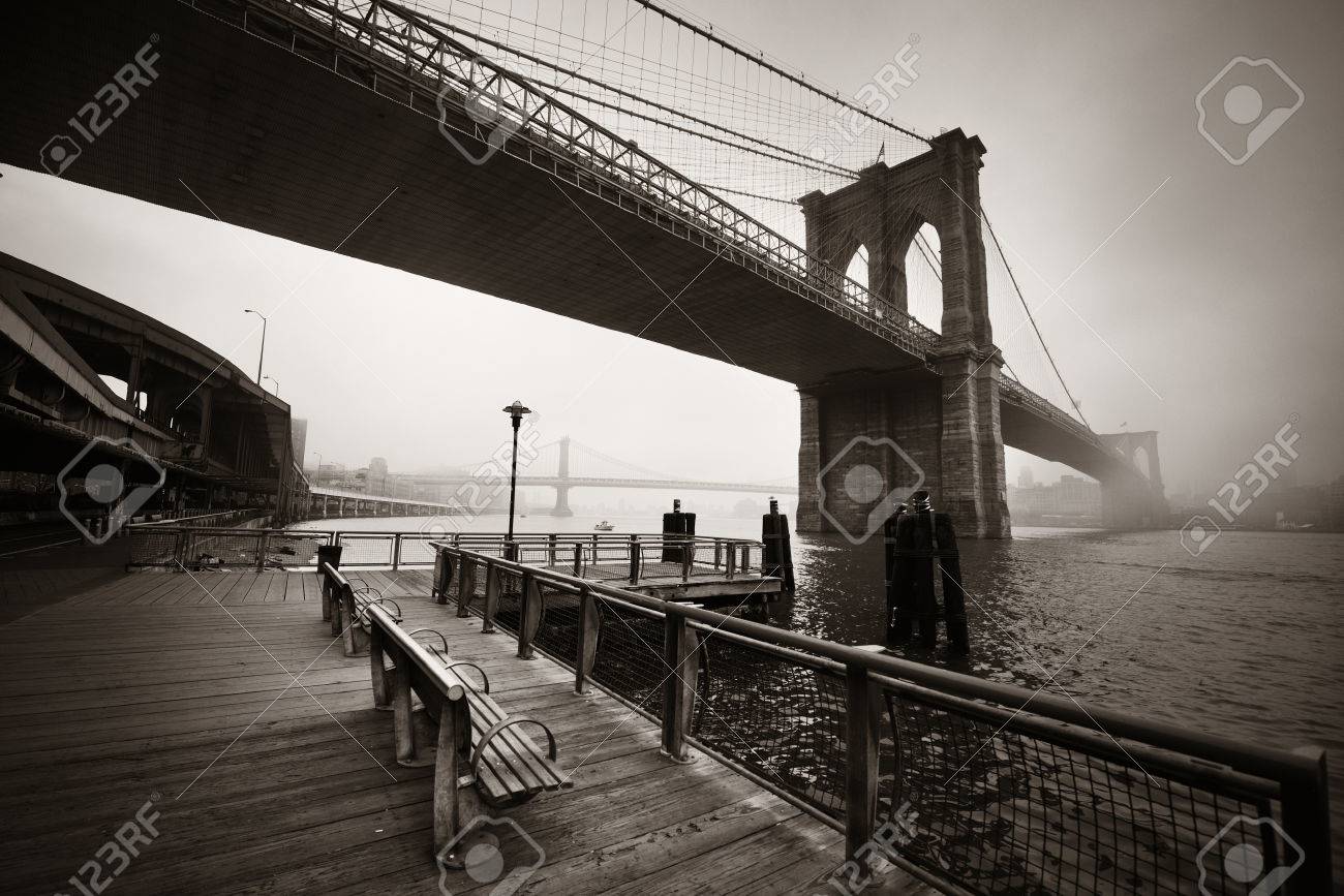 Brooklyn Bridge in a foggy day in downtown Manhattan - 64927219 Brooklyn Bridge in a foggy day in downtown Manhattan - 64927219