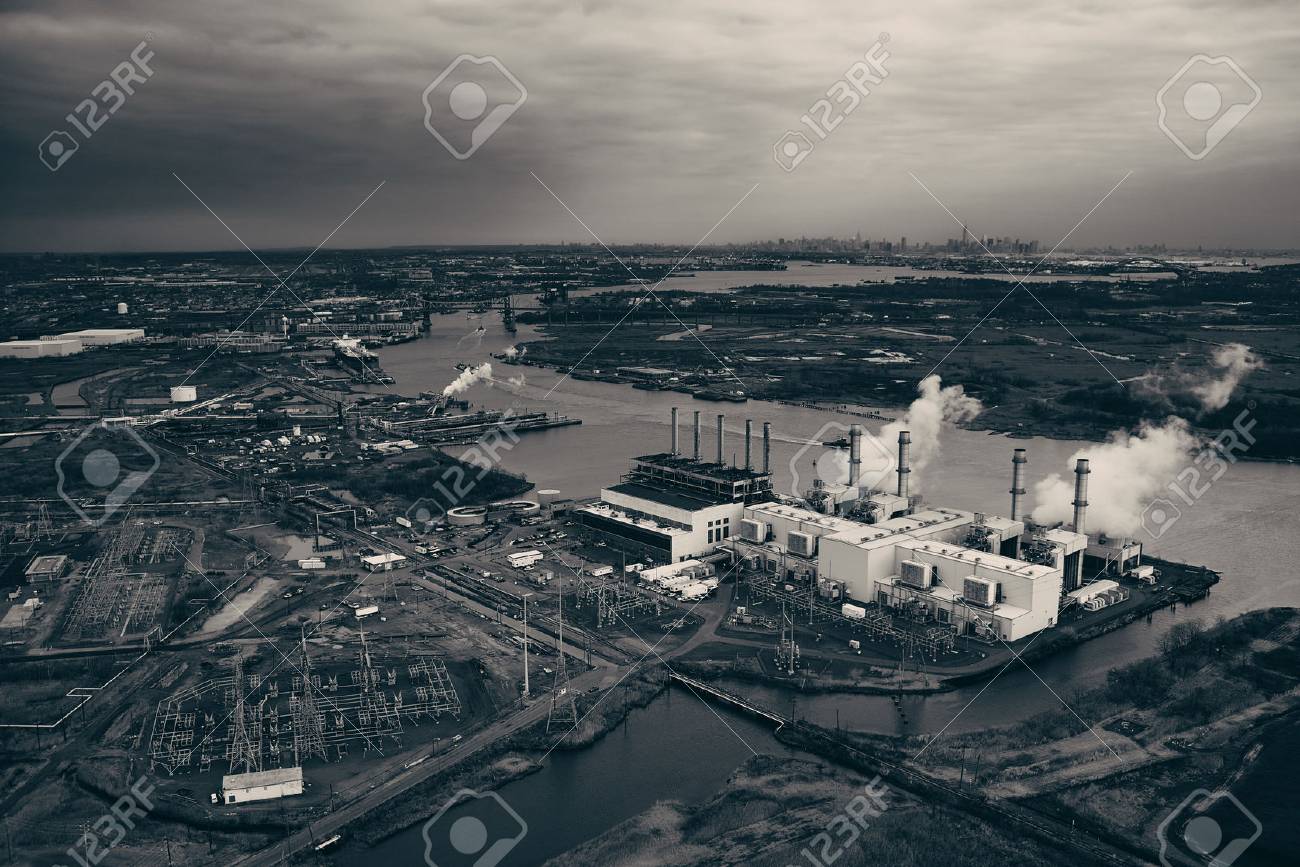 New Jersey oil industry with New York City skyline from afar aerial view - 72061487 New Jersey oil industry with New York City skyline from afar aerial view - 72061487