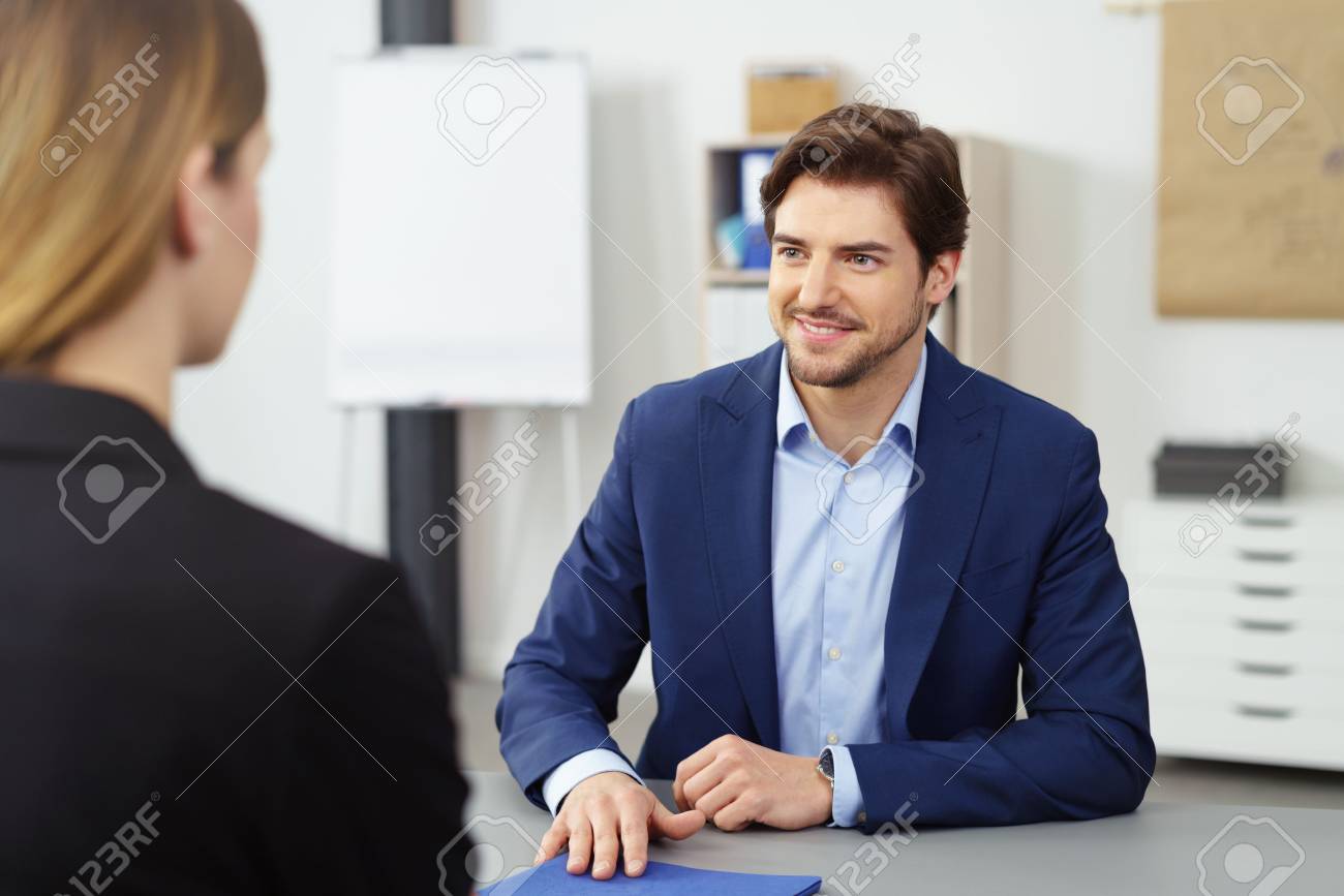young businessman conducting an interview with a female job seeker job seeker interview