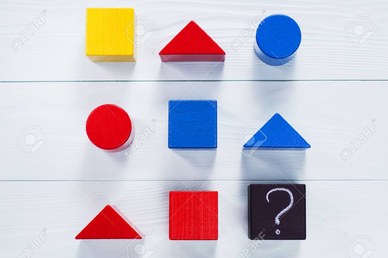 IQ test. Choose correct answer. Logical tasks composed of geometric wooden shapes. Children's educational logical task, flat lay. - 69025176 IQ test. Choose correct answer. Logical tasks composed of geometric wooden shapes. Children's educational logical task, flat lay. - 69025176