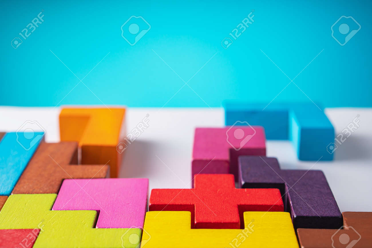 Geometric shapes on a wooden background. The concept of logical thinking. - 166513590 Geometric shapes on a wooden background. The concept of logical thinking. - 166513590