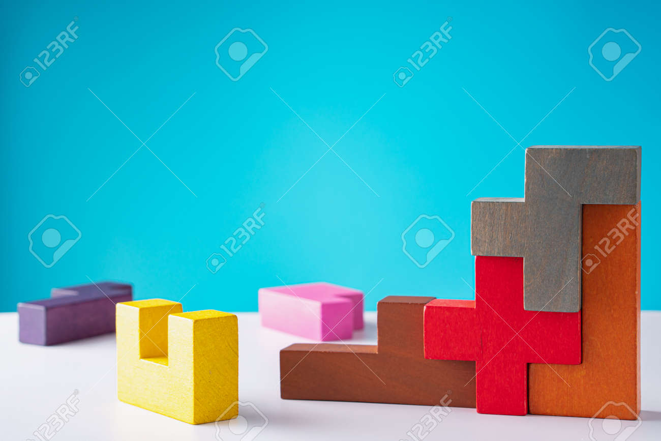 Geometric shapes on a wooden background. The concept of logical thinking. - 166145291 Geometric shapes on a wooden background. The concept of logical thinking. - 166145291