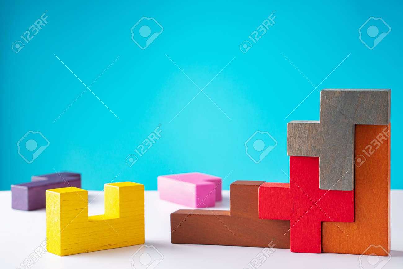 Geometric shapes on a wooden background. The concept of logical thinking. - 166145417 Geometric shapes on a wooden background. The concept of logical thinking. - 166145417