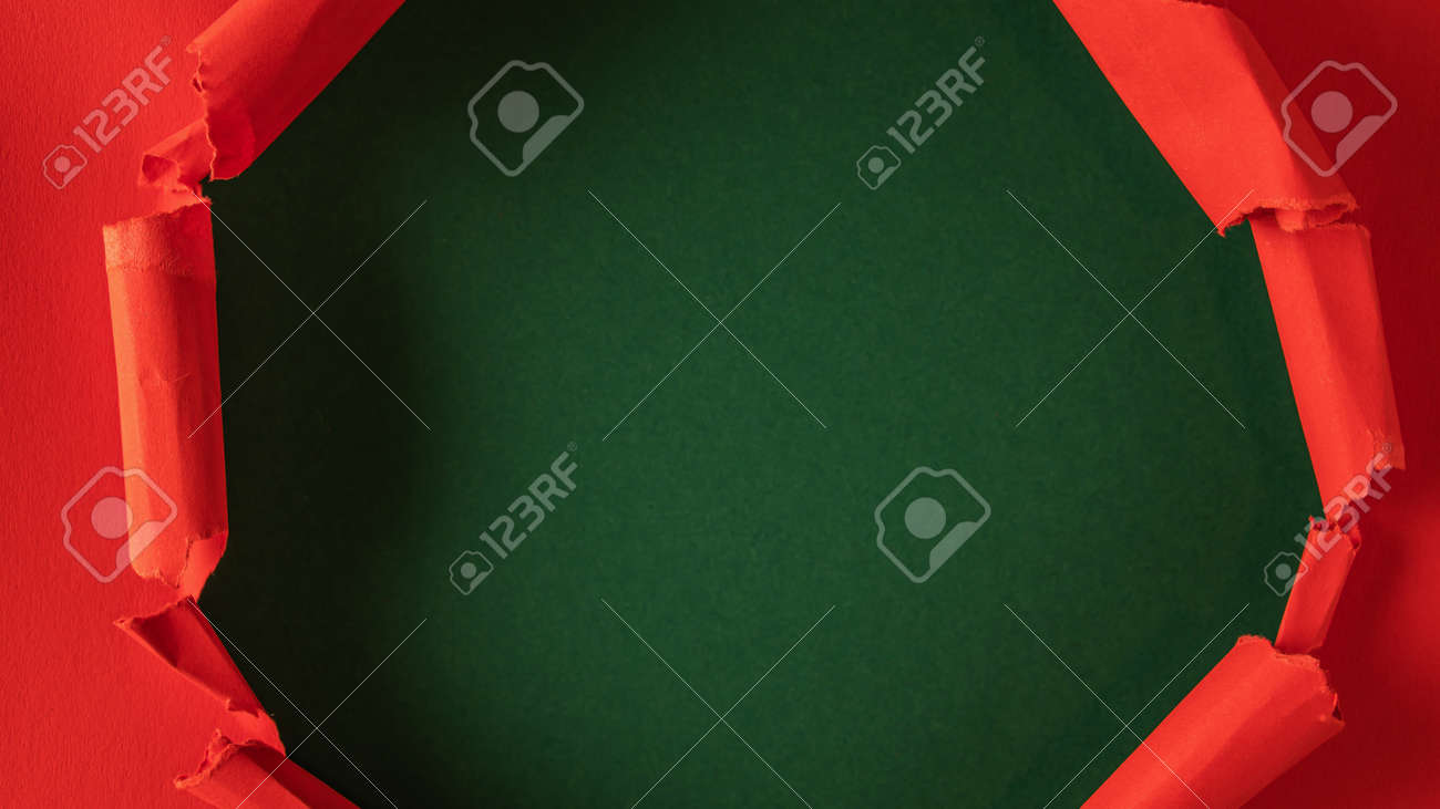 Red paper is torn over green background for message. Template for your text. - 166145457 Red paper is torn over green background for message. Template for your text. - 166145457