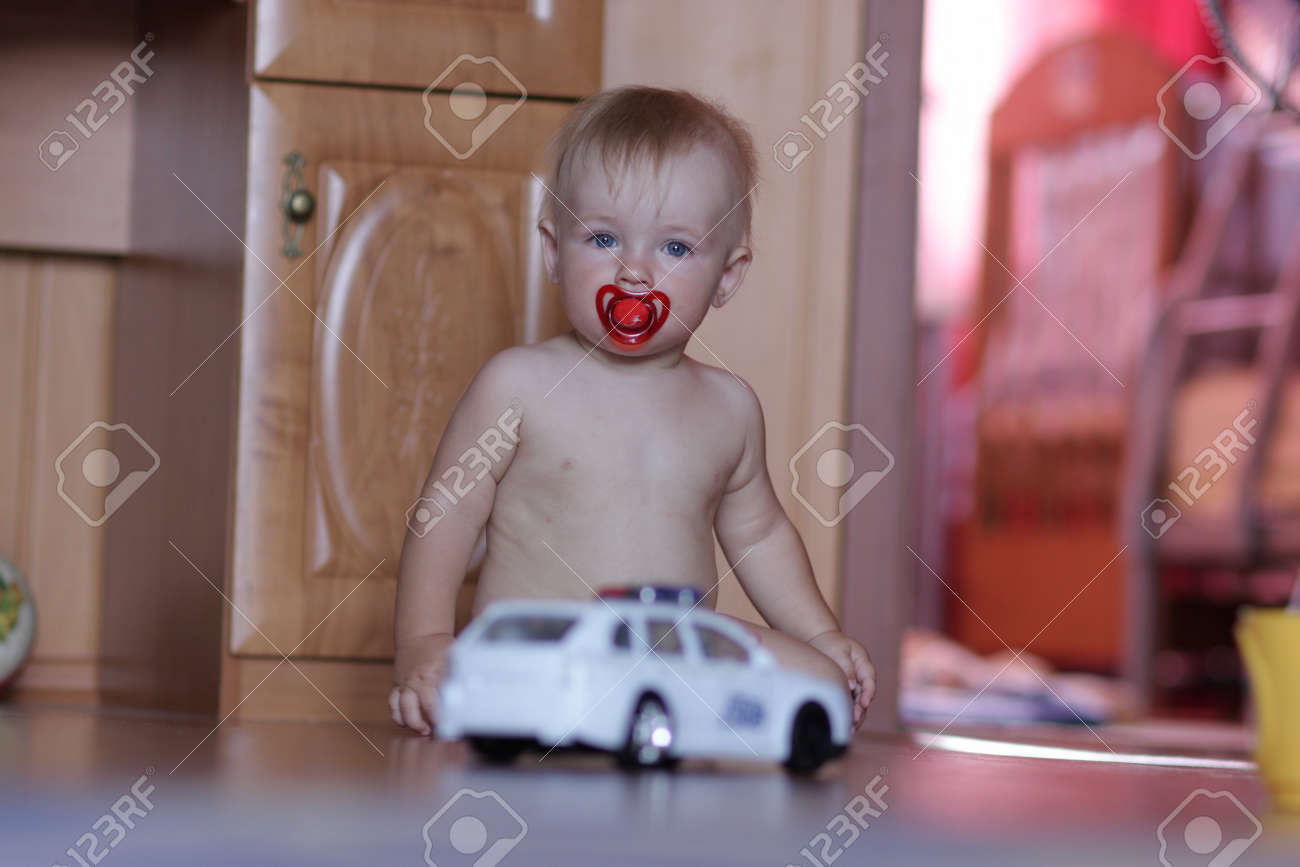 toy car baby sits in