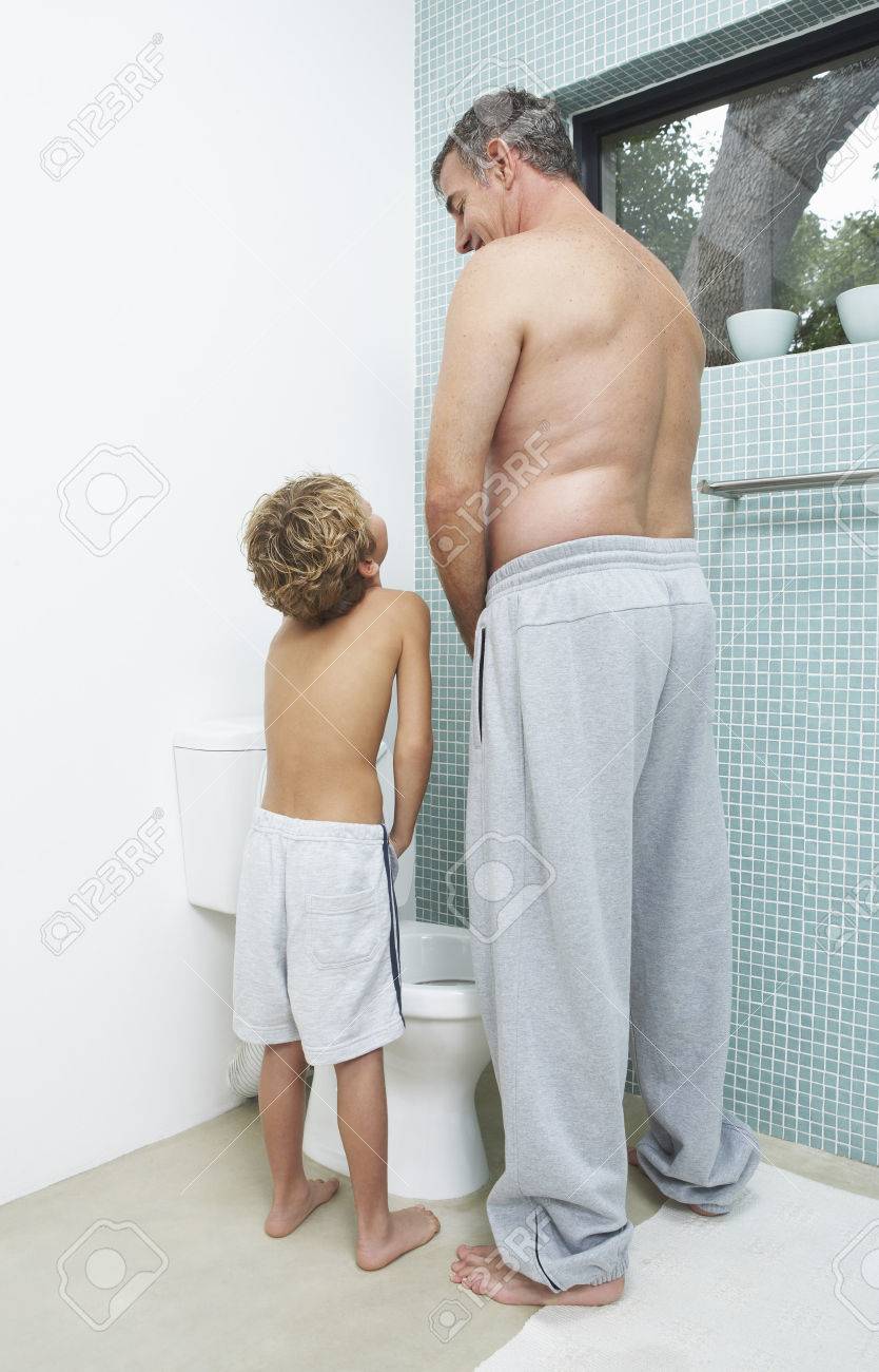 85428793-father-and-son-urinating.jpg