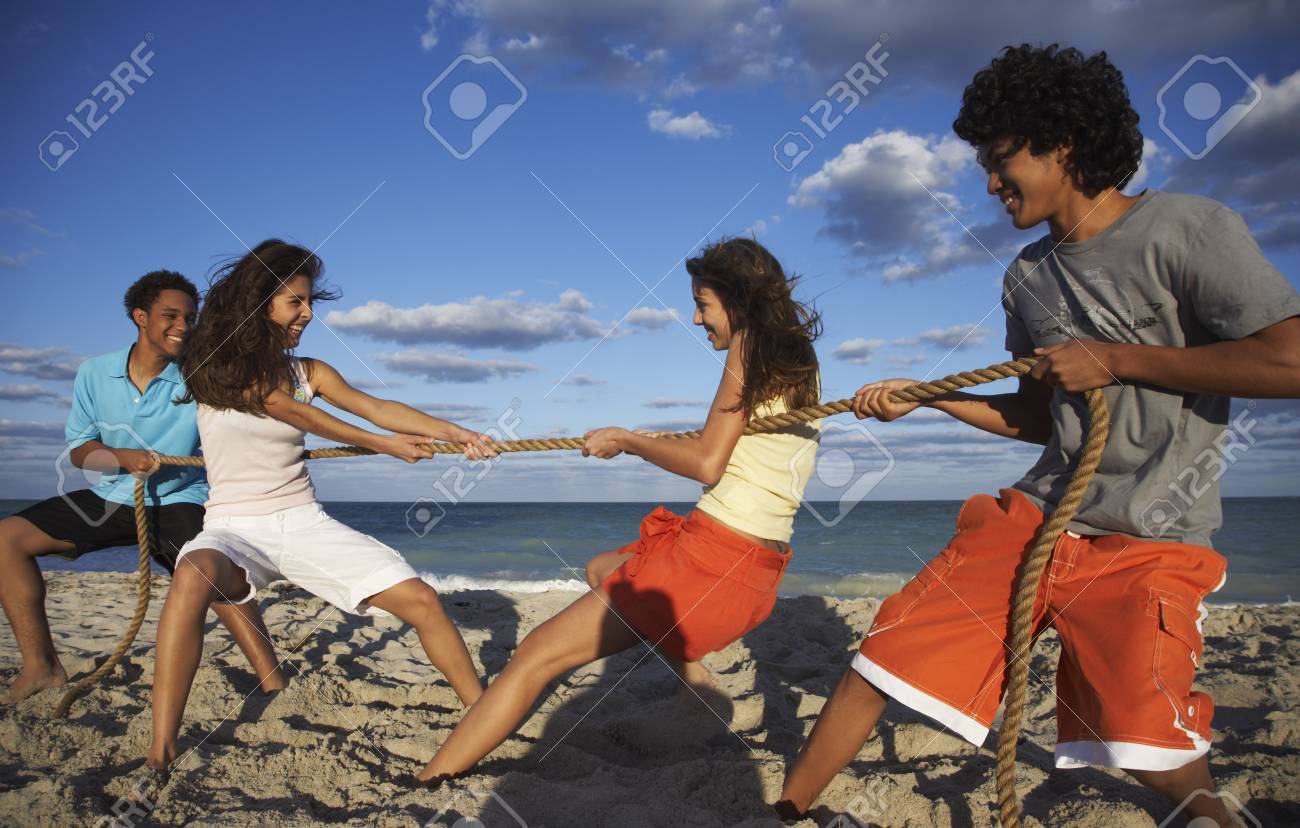 Friends Playing Tug Of War On Beach Stock Photo 86238081 Friends Playing Tug Of War On Beach Stock Photo 86238081