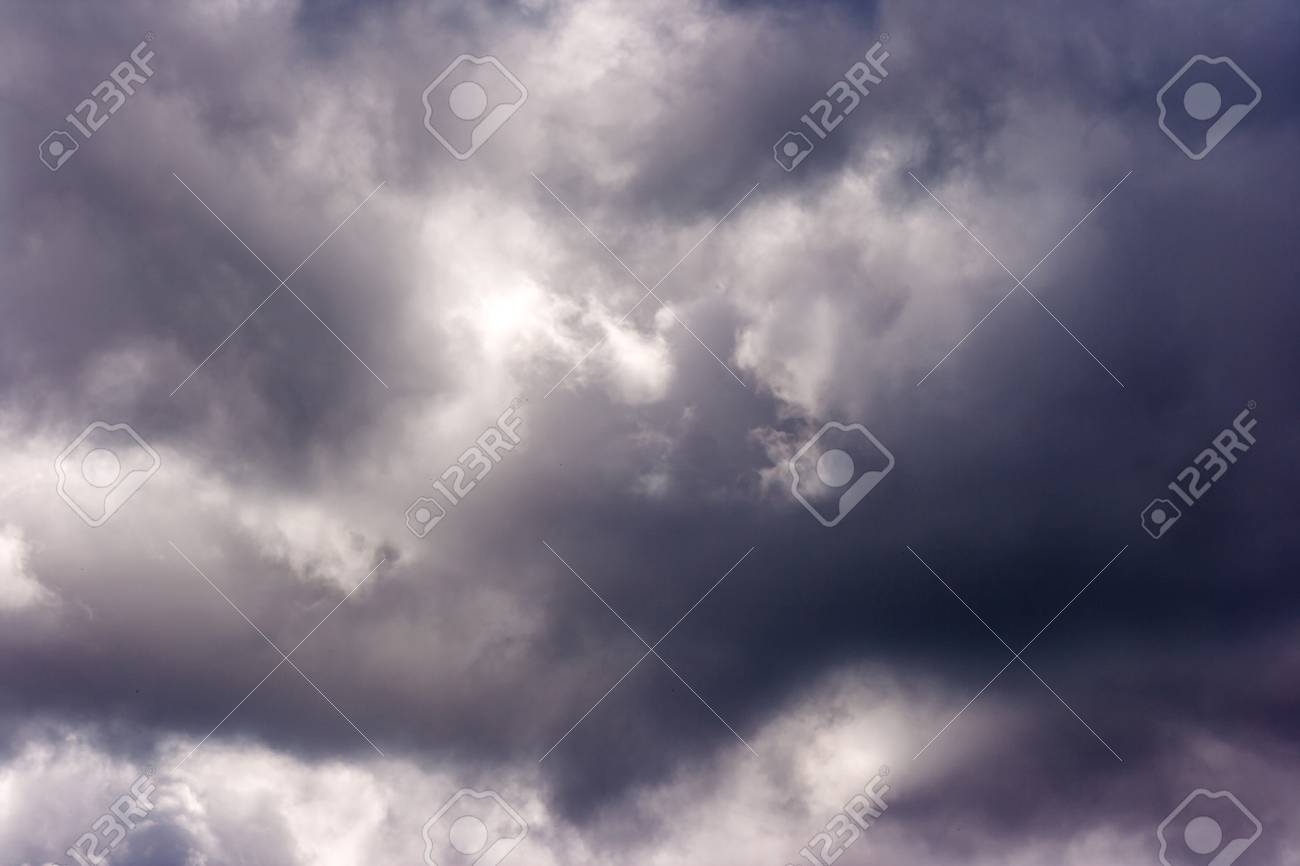 Storm Cloud On Sunny Day Light In The Dark And Dramatic Storm Stock Photo Picture And Royalty Free Image Image