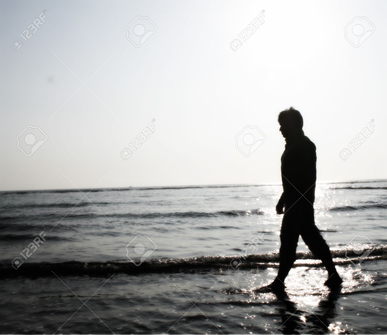 Sad Boy Walking Near Beach Stock Photo, Picture And Royalty Free ...