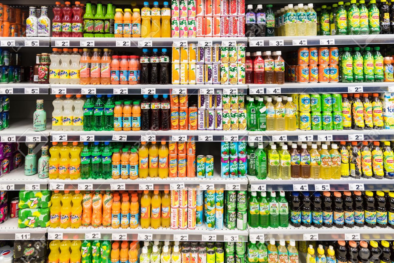 BUCHAREST, ROMANIA FEBRUARY 28, 2015: Soda Drinks On Supermarket - 1300x867 - jpeg Beverages In The Supermarket Aisle