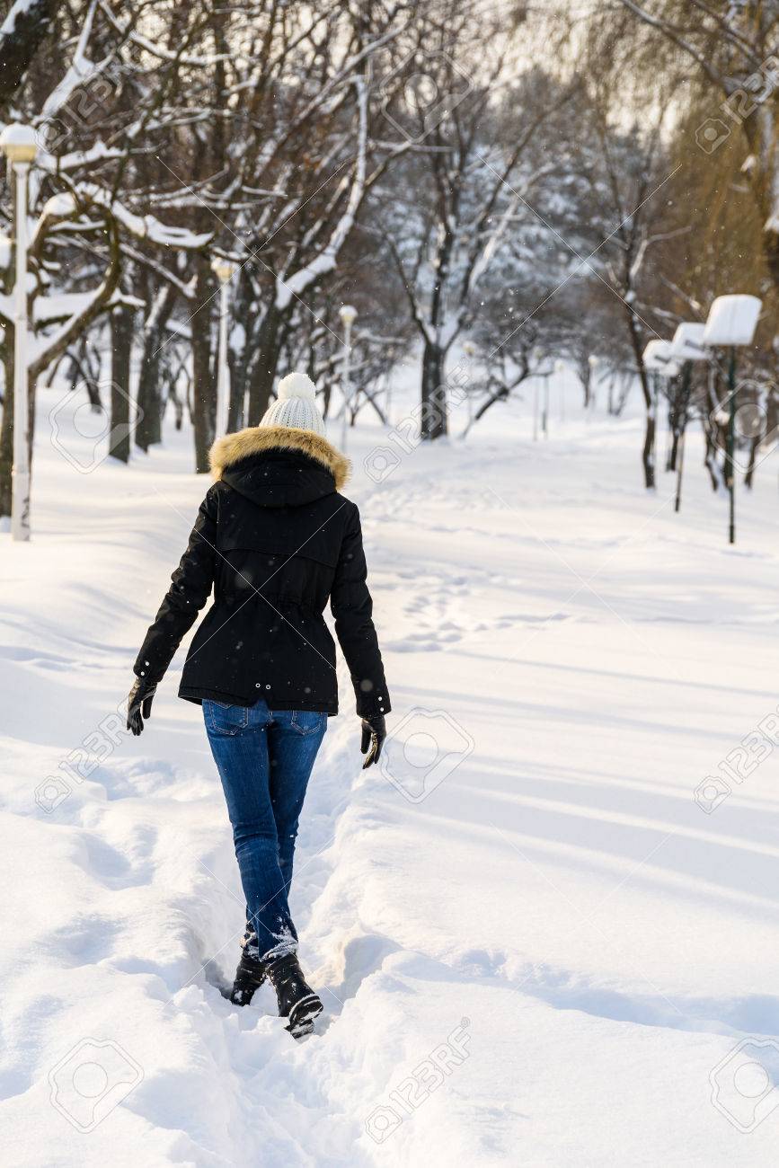 girl walking in snow