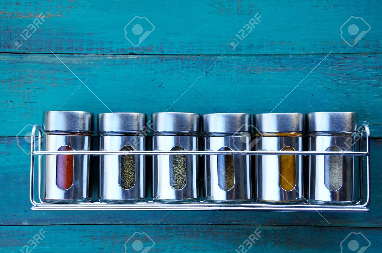 Spice rack on a wooden wall. Food background. copy space - 62201368 Spice rack on a wooden wall. Food background. copy space - 62201368