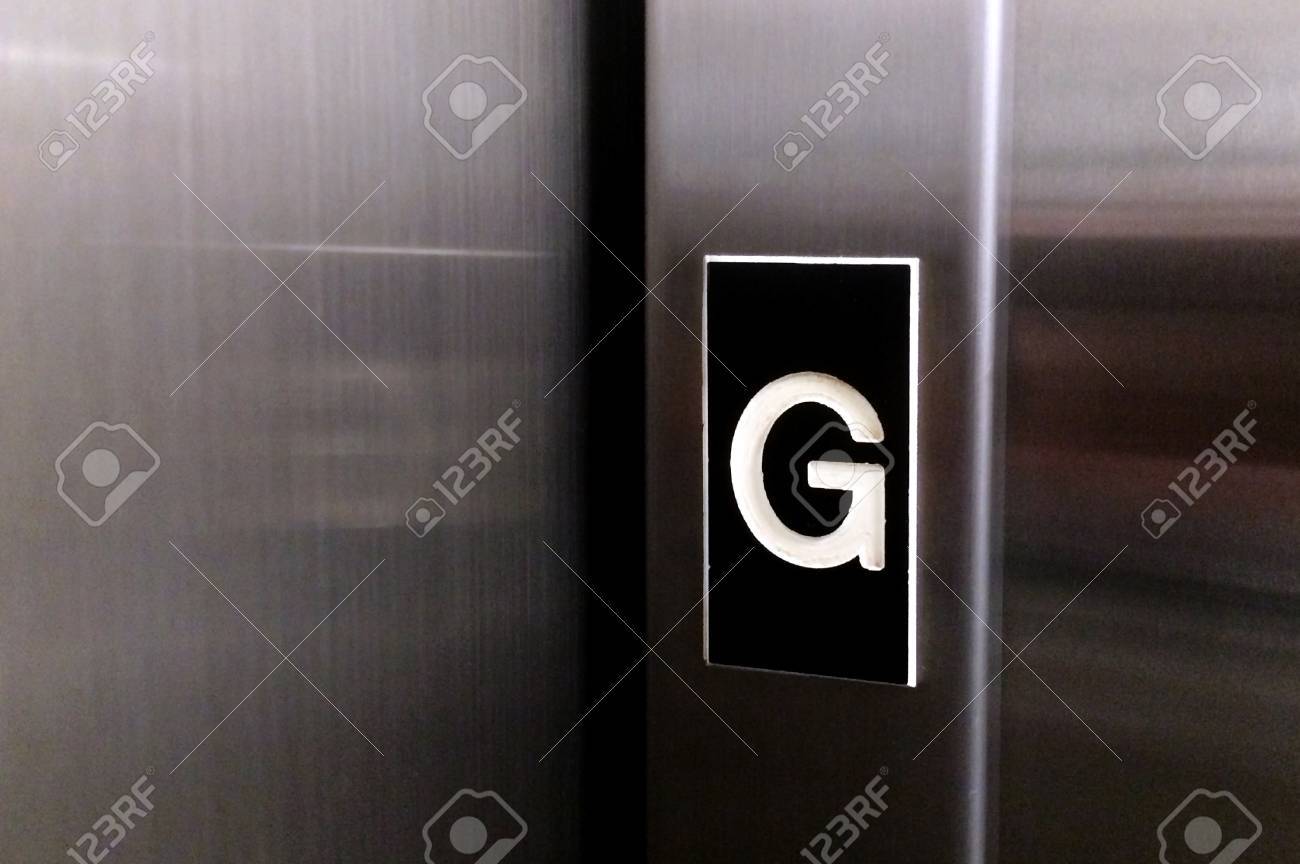 The Letter G On Elevator Lift Door Indicating For Ground Floor