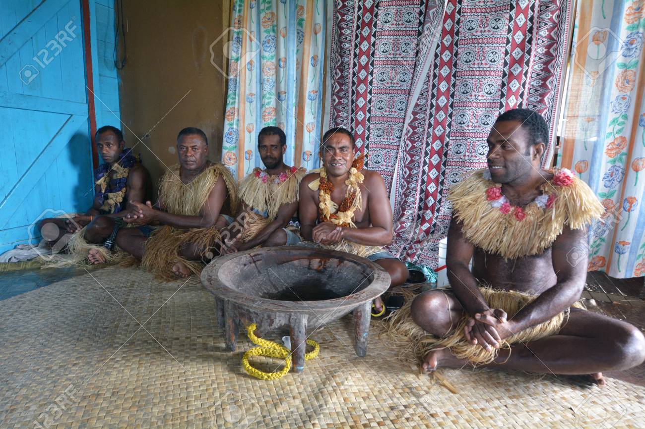 Indigenous Fijians men participate in traditional Kava Ceremony in Fiji. The consumption of the drink is a form of welcome and figures in important socio-political events. - 70725685 Indigenous Fijians men participate in traditional Kava Ceremony in Fiji. The consumption of the drink is a form of welcome and figures in important socio-political events. - 70725685