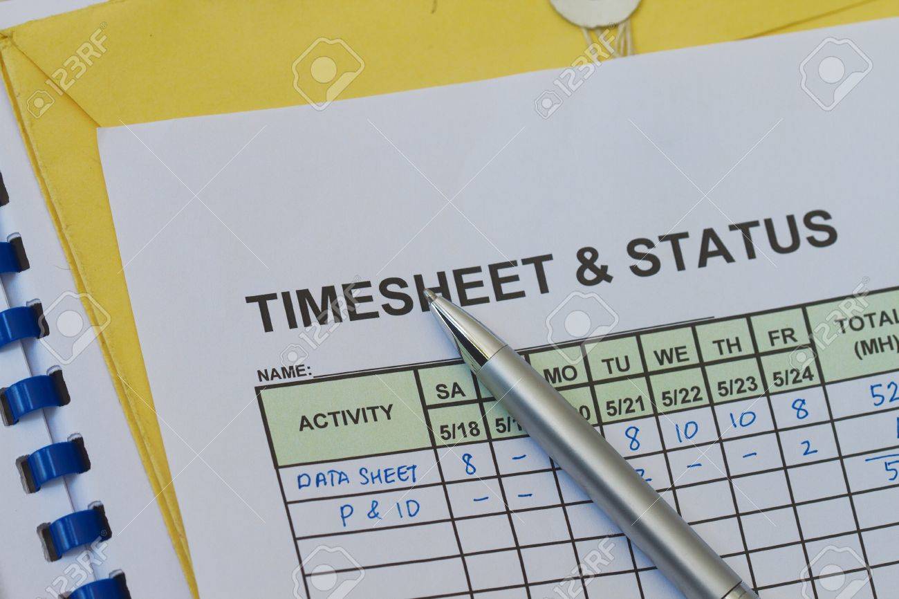 weekly timesheet with pen timekeeping record and payroll stock