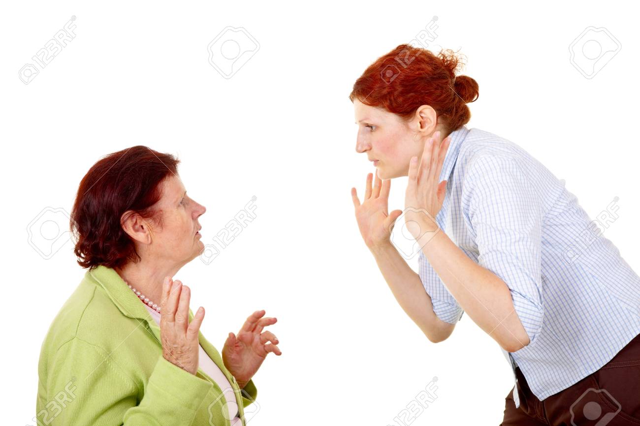 senior woman and young woman disputing about something stock photo disputing