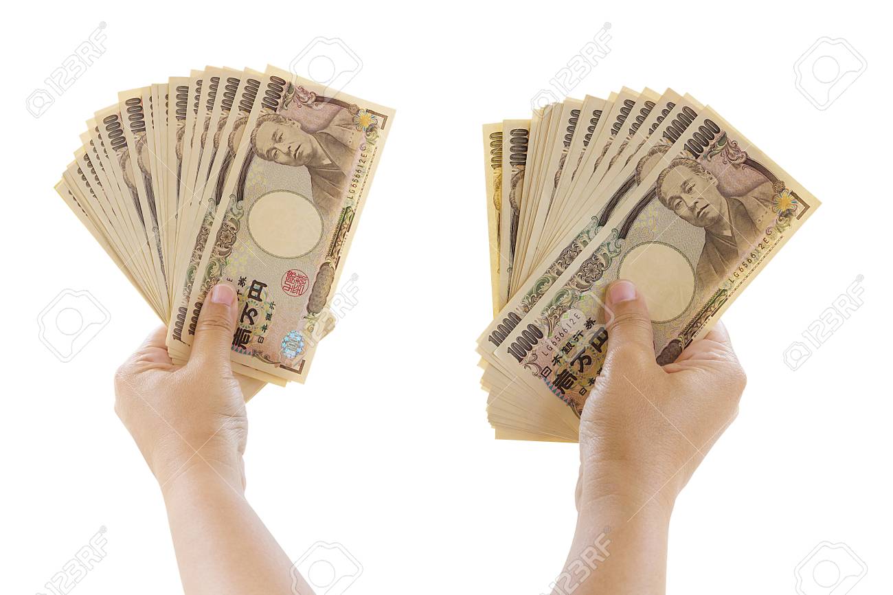 Woman Hand Holding Banknote Of 10,000 Japanese Yen Bills Isolated On White  Background Stock Photo, Picture and Royalty Free Image. Image 102692432.