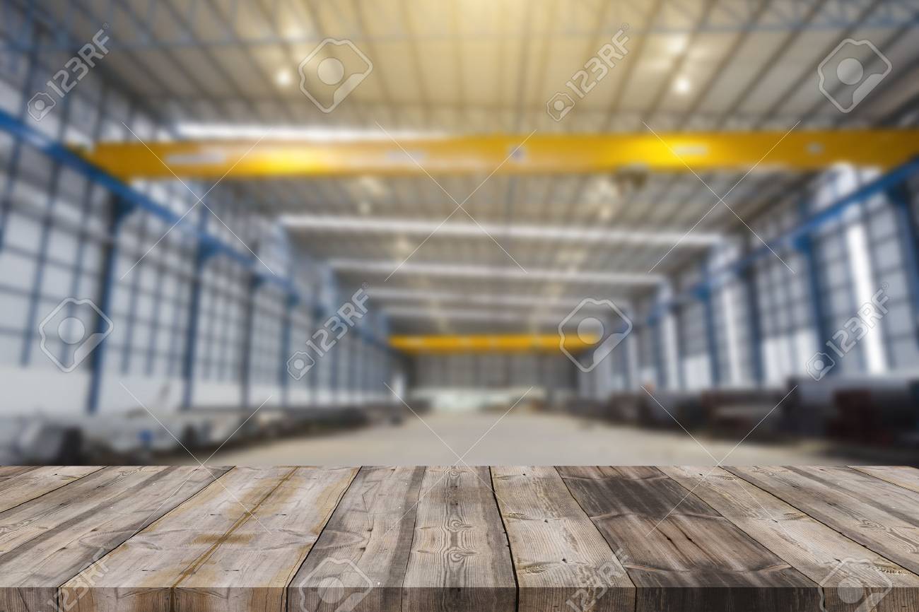 Wood Table Top On Blur Factory Hall Or Garage Background Stock Photo Picture And Royalty Free Image Image 65274179 Download 10,000+ royalty free garage background vector images. wood table top on blur factory hall or garage background