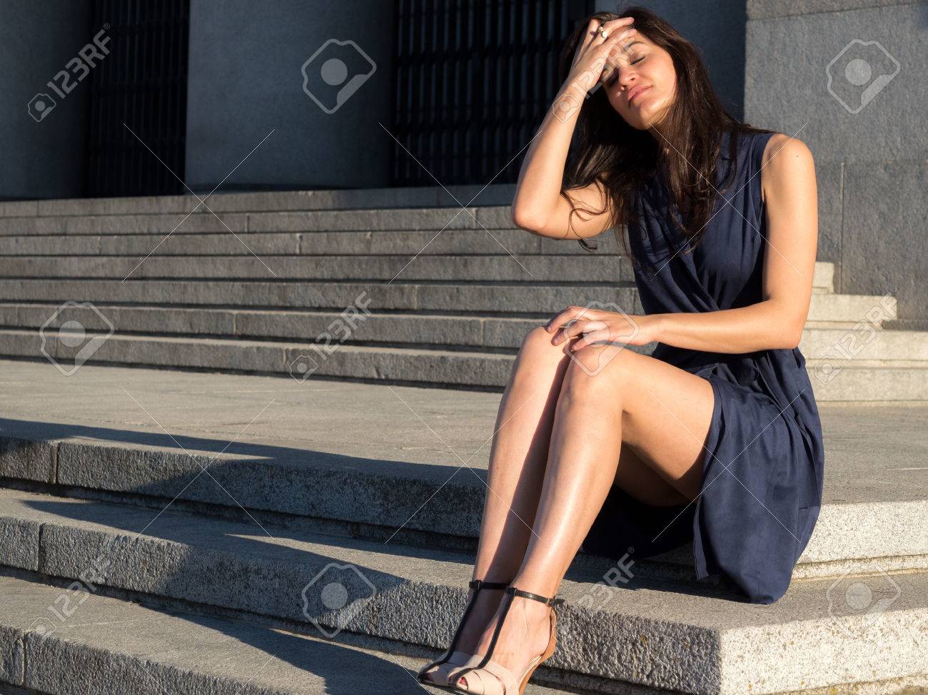 Beautiful And Elegant Woman With Very Nice Legs Sitting Alone Stock Photo Picture And Royalty Free Image Image 57737742