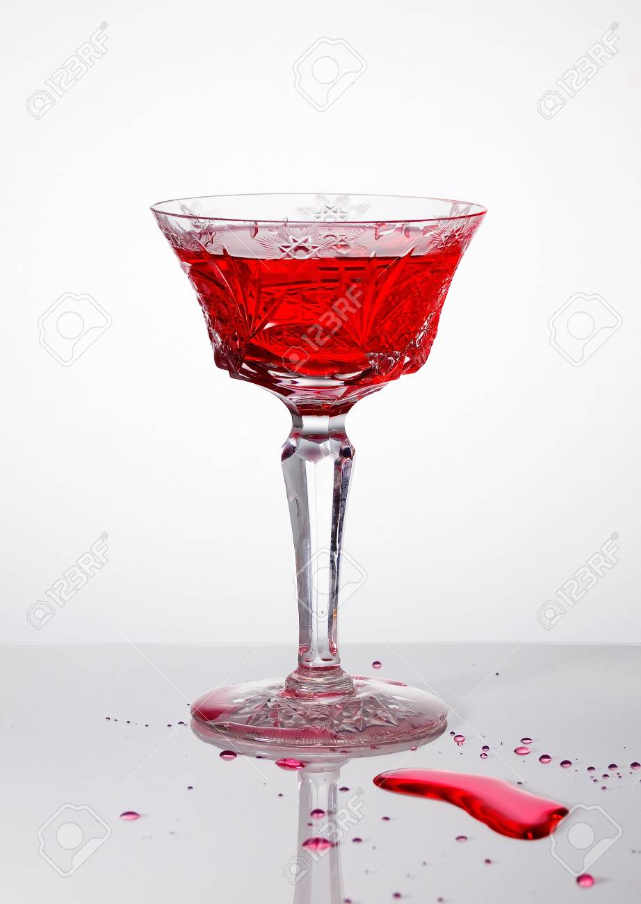 wine glass and spilled wine splash forming stock photo picture and