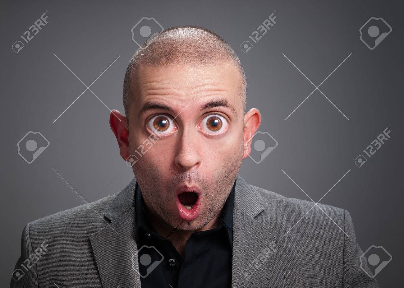 Businessman with surprise expression The photo has a digital retouching with eyes wide open - 24357272 Businessman with surprise expression The photo has a digital retouching with eyes wide open - 24357272
