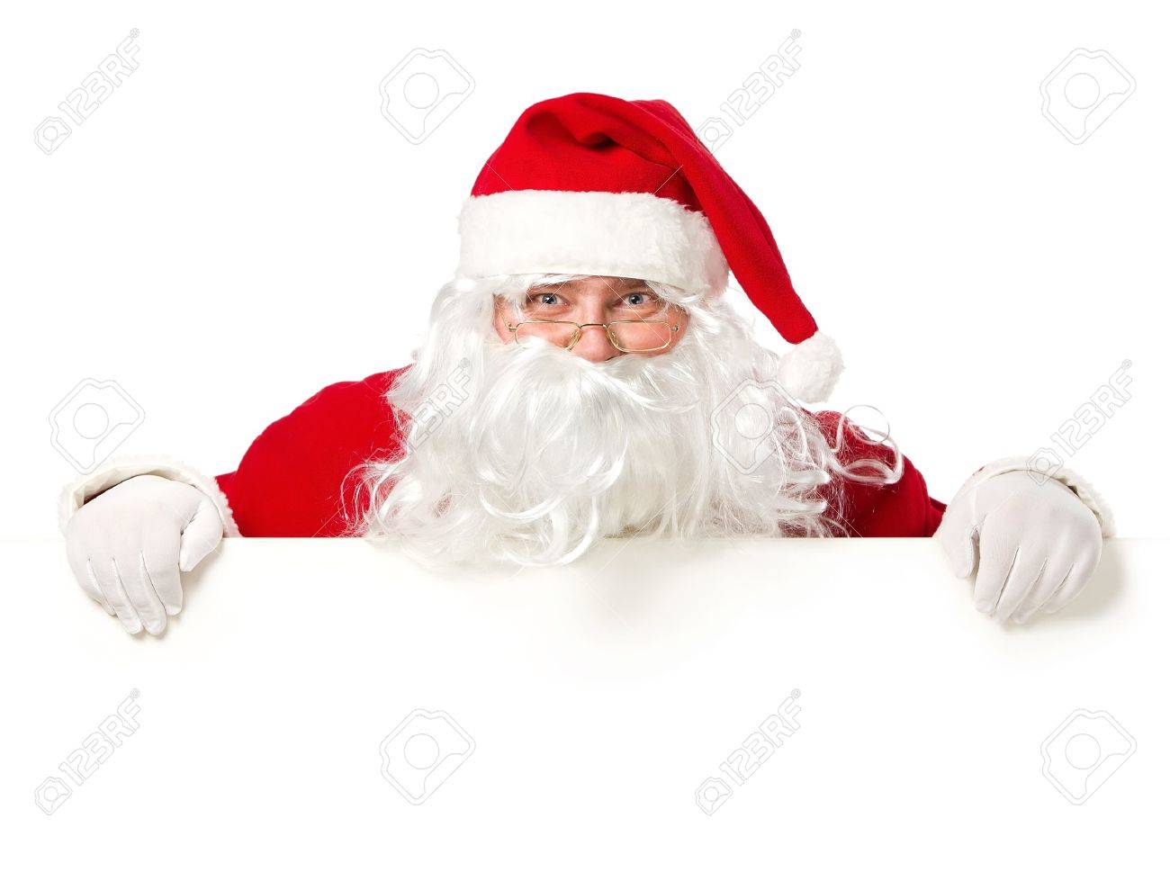 Happy Santa Claus looking out from behind the blank sign isolated on white background with copy space - 16519317 Happy Santa Claus looking out from behind the blank sign isolated on white background with copy space - 16519317