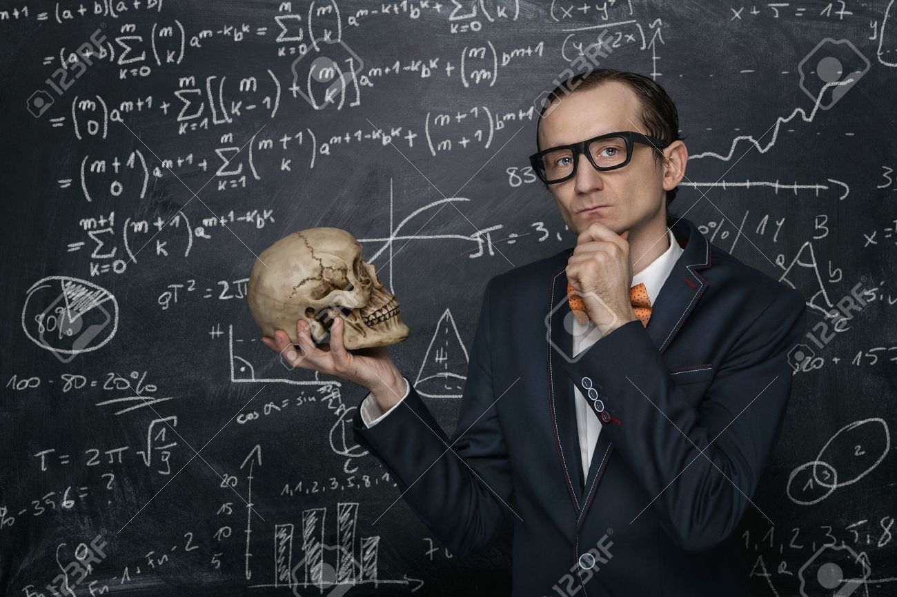 Funny smart nerd against chalkboard with many math formulas - 39940782 Funny smart nerd against chalkboard with many math formulas - 39940782
