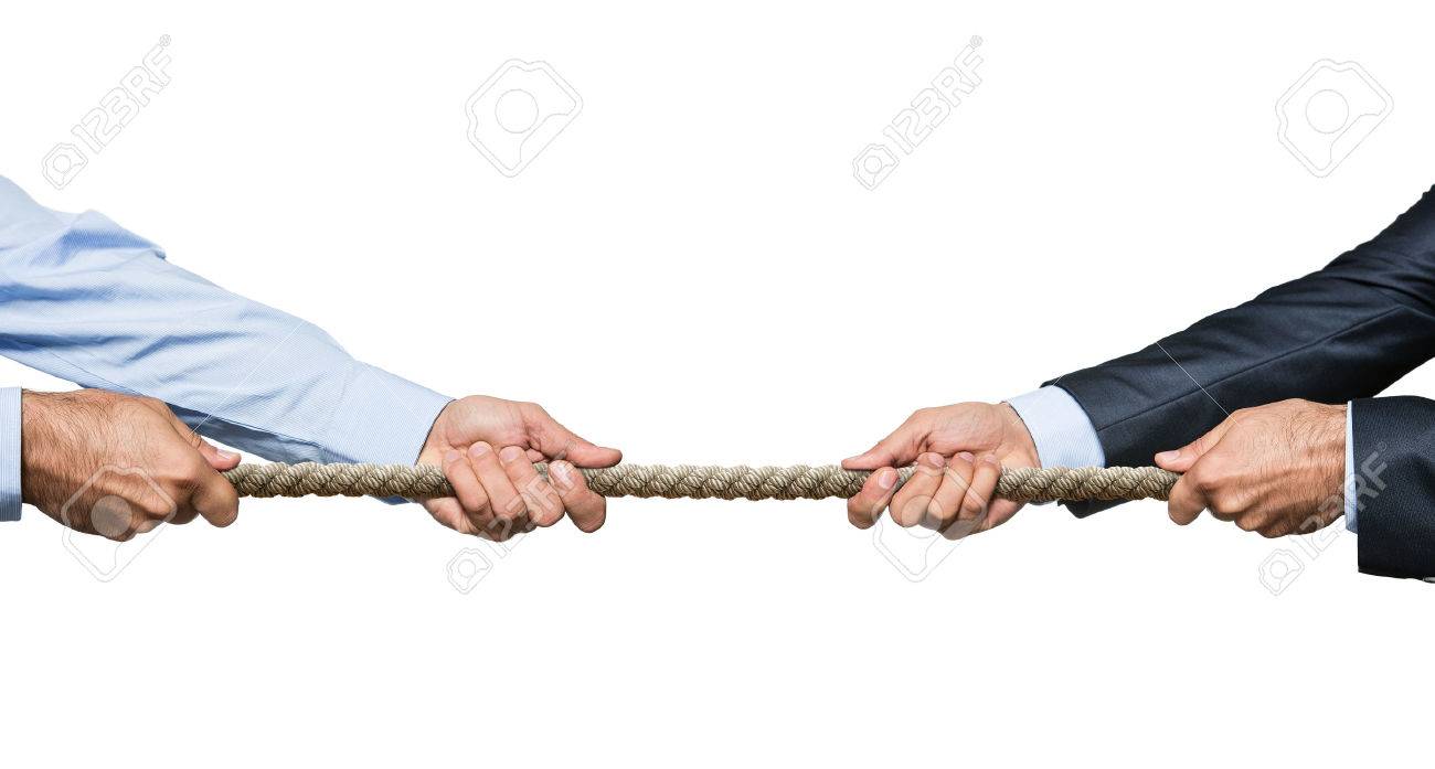 Tug war, two businessman pulling a rope in opposite directions oisolated on white background - 50918540 Tug war, two businessman pulling a rope in opposite directions oisolated on white background - 50918540
