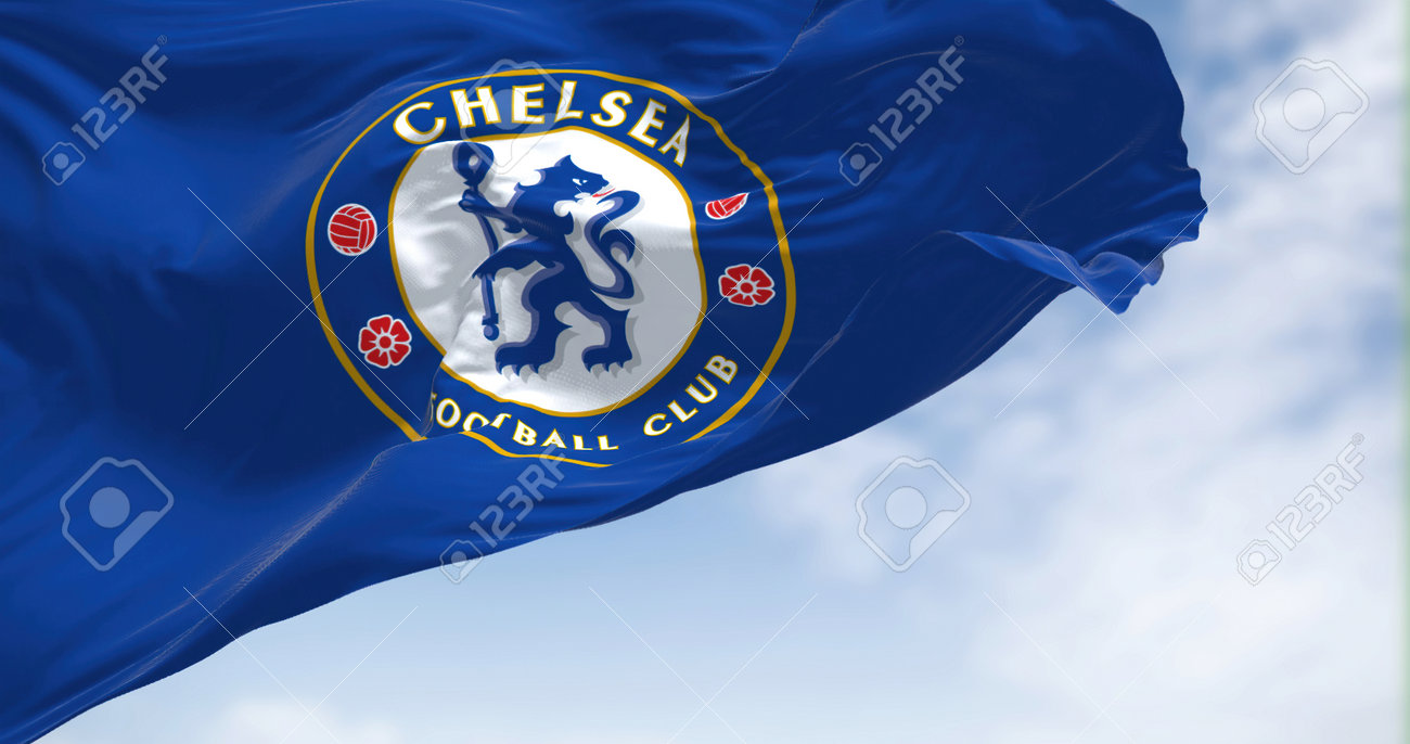 London, UK, May 2022: The Flag Of Chelsea Football Club Waving In The Wind  On A Clear Day. Chelsea F.C. Is A Professional Football Club Based In  Fulham, London Stock Photo, Picture