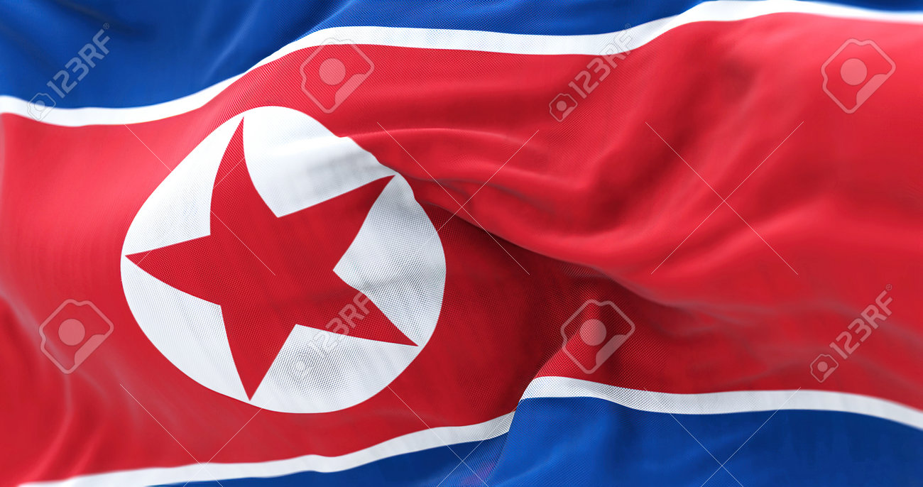 朝鮮民主主義人民共和国 北朝鮮の国旗を振る様子。朝鮮民主主義人民共和国は東アジアの国です。波打つ生地。テクスチャ背景。選択フォーカス。リアルな3Dイラストの写真素材・画像素材  Image 197703419