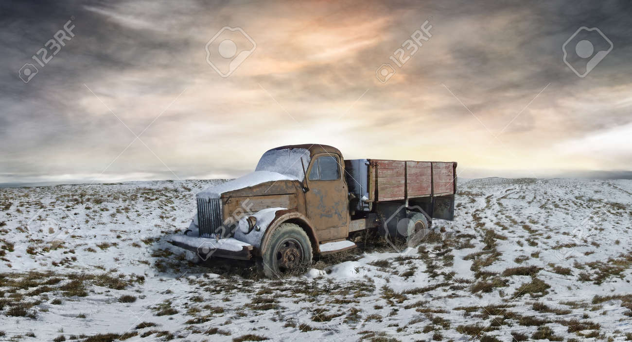 A picture of the abandoned Soviet truck in the midst of snowy plain - 153380727 A picture of the abandoned Soviet truck in the midst of snowy plain - 153380727
