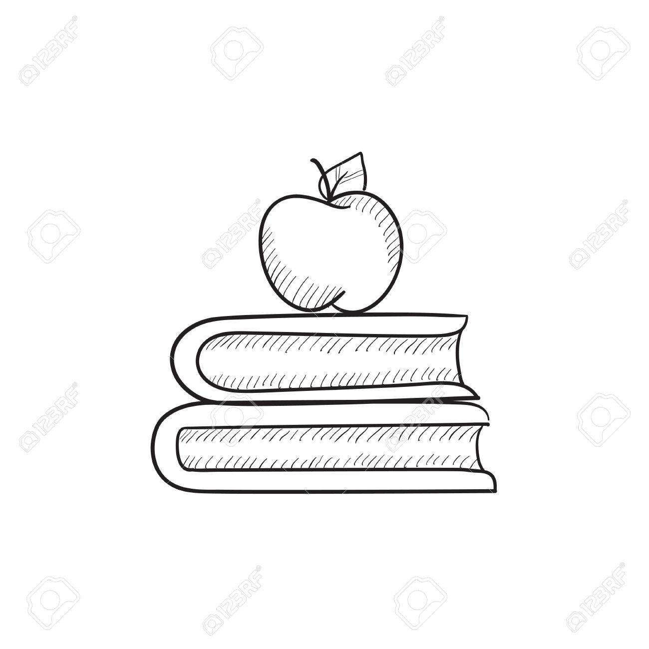 books and apple on