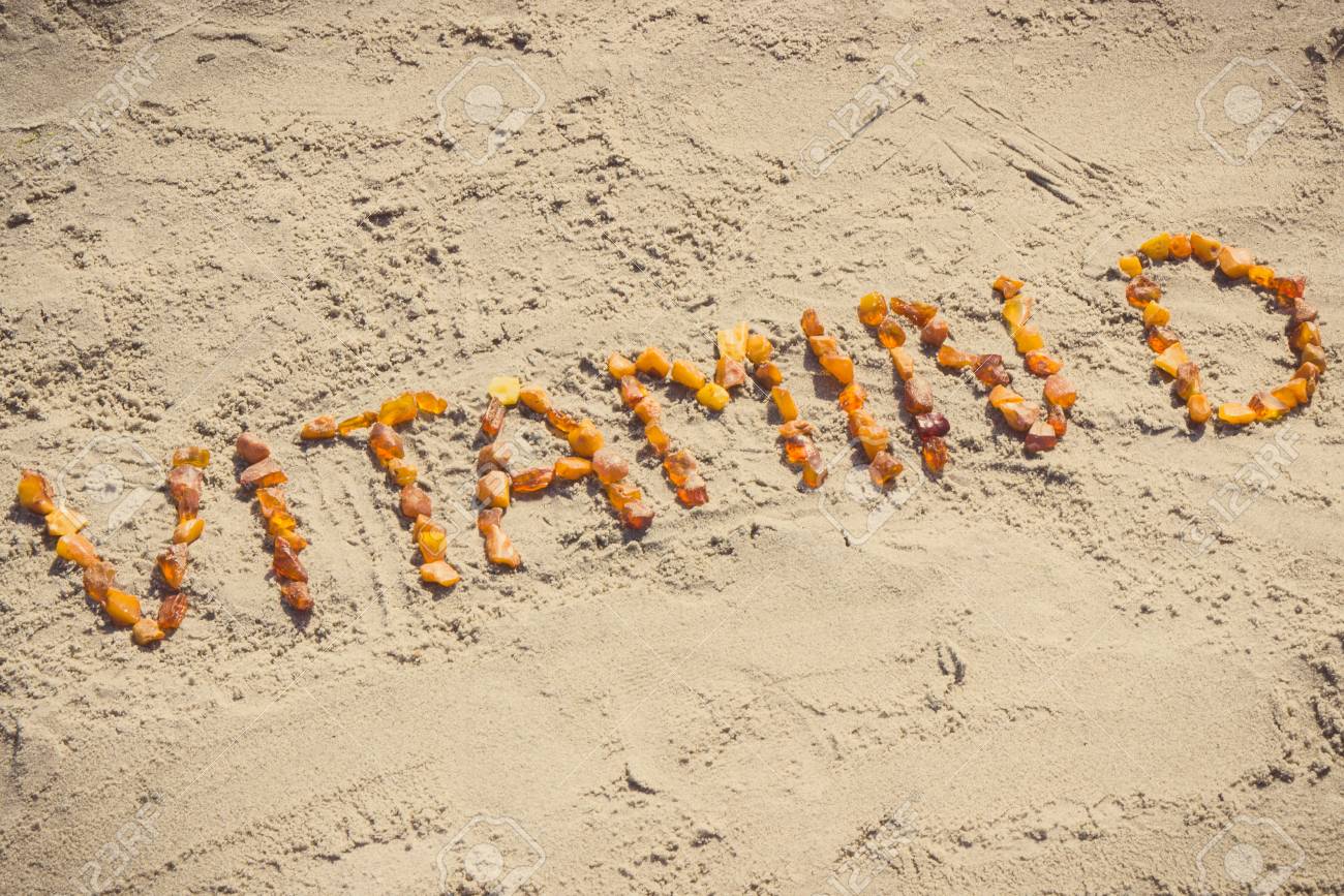 Vintage photo, Inscription vitamin D made of amber stones on sand at beach, concept of vacation time, healthy lifestyle and prevention of vitamin D deficiency - 96666306 Vintage photo, Inscription vitamin D made of amber stones on sand at beach, concept of vacation time, healthy lifestyle and prevention of vitamin D deficiency - 96666306