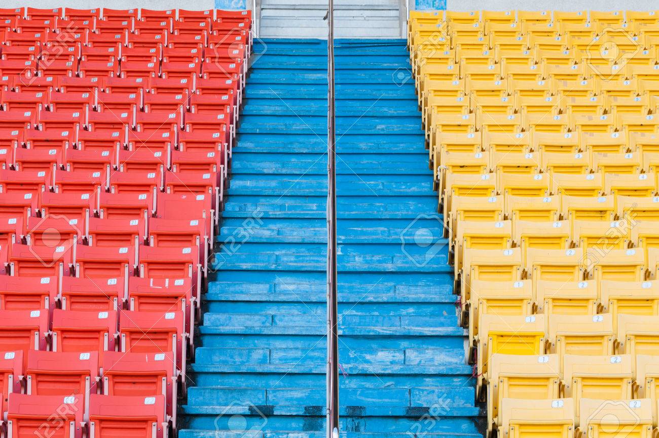 Empty Orange And Yellow Seats At Stadium Rows Of Seat On A Soccer Stadium Stock Photo Picture And Royalty Free Image Image
