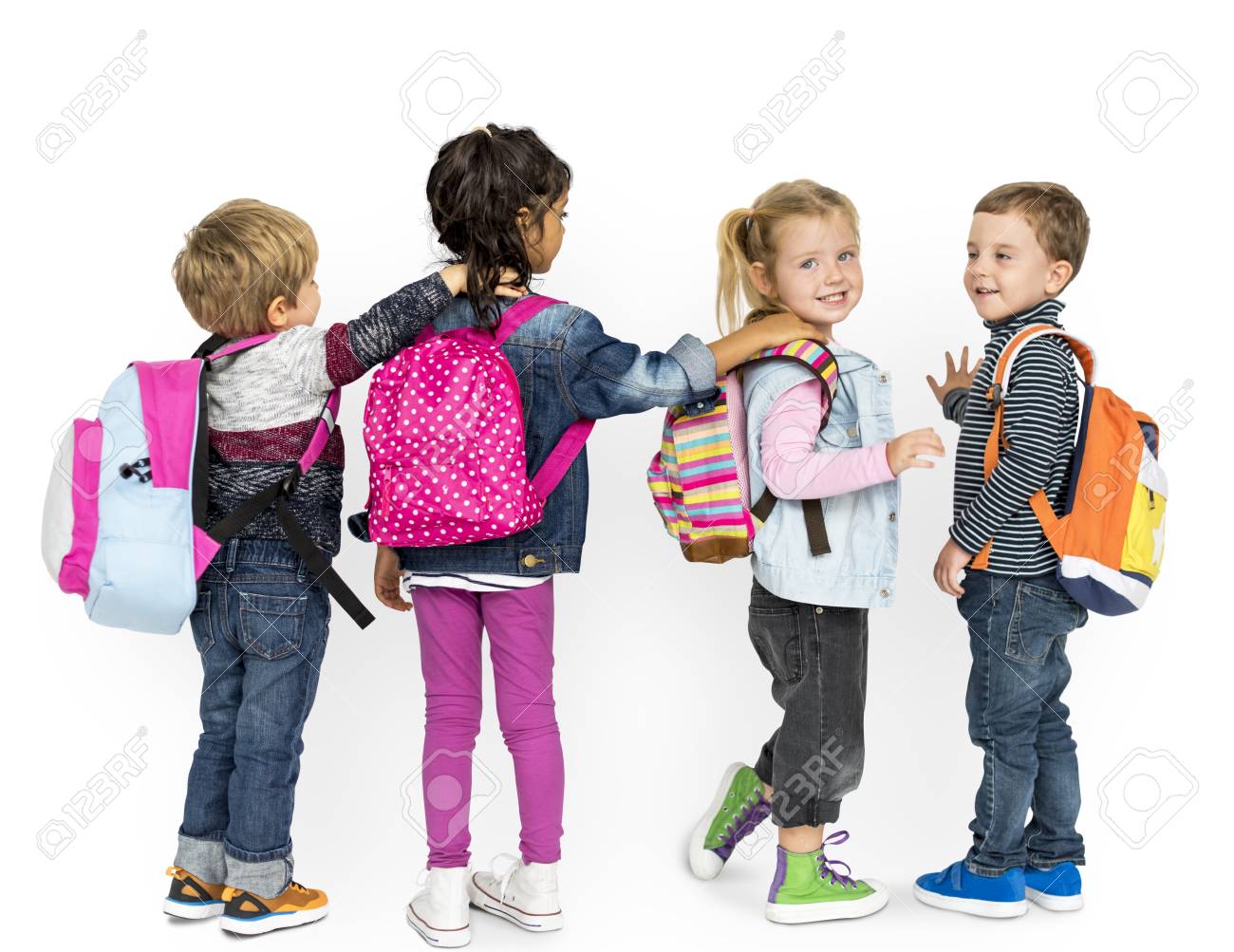 child carrying backpack