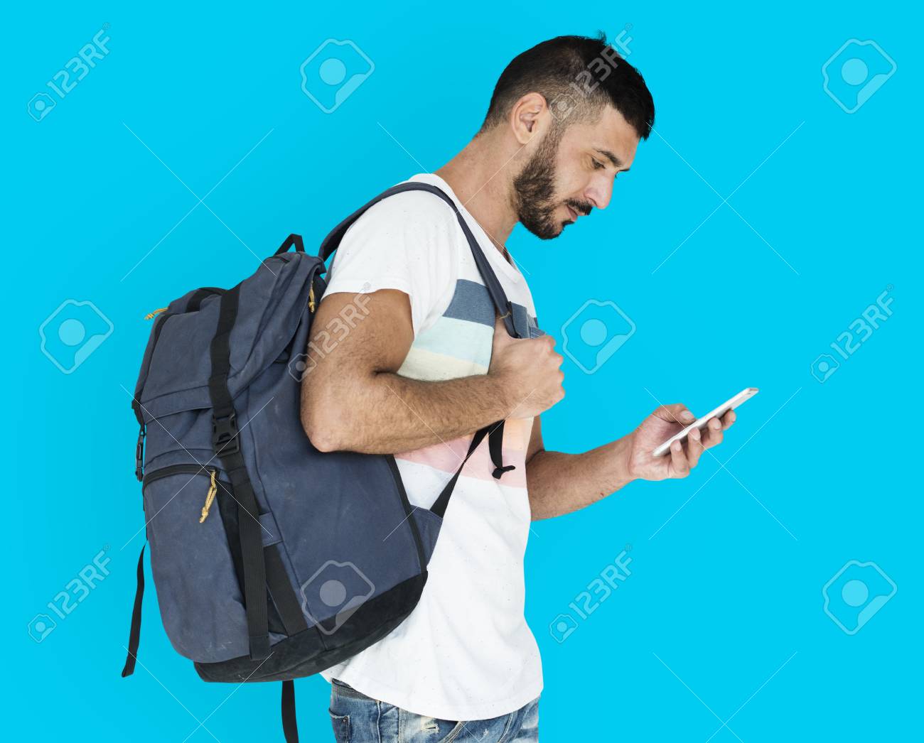 man carrying backpack