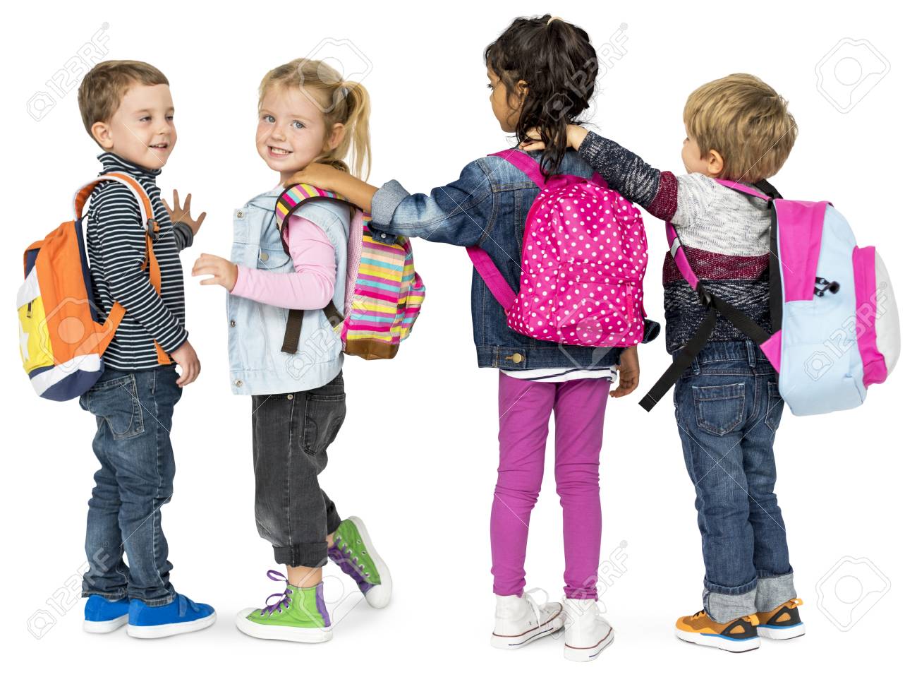 child carrying backpack