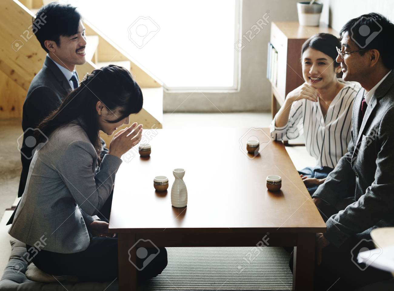 90762250-japanese-friends-having-a-great-time-together.jpg