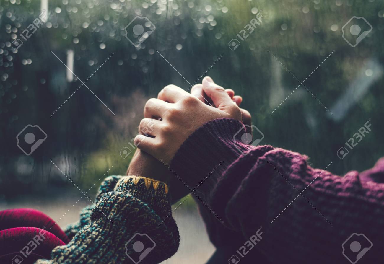 Happy Couple Holding Hands In The Rain Free Image and Photograph