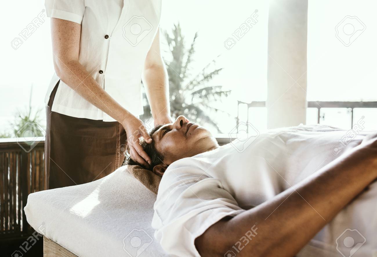 massage therapist massaging at a spa stock photo picture and free massaging