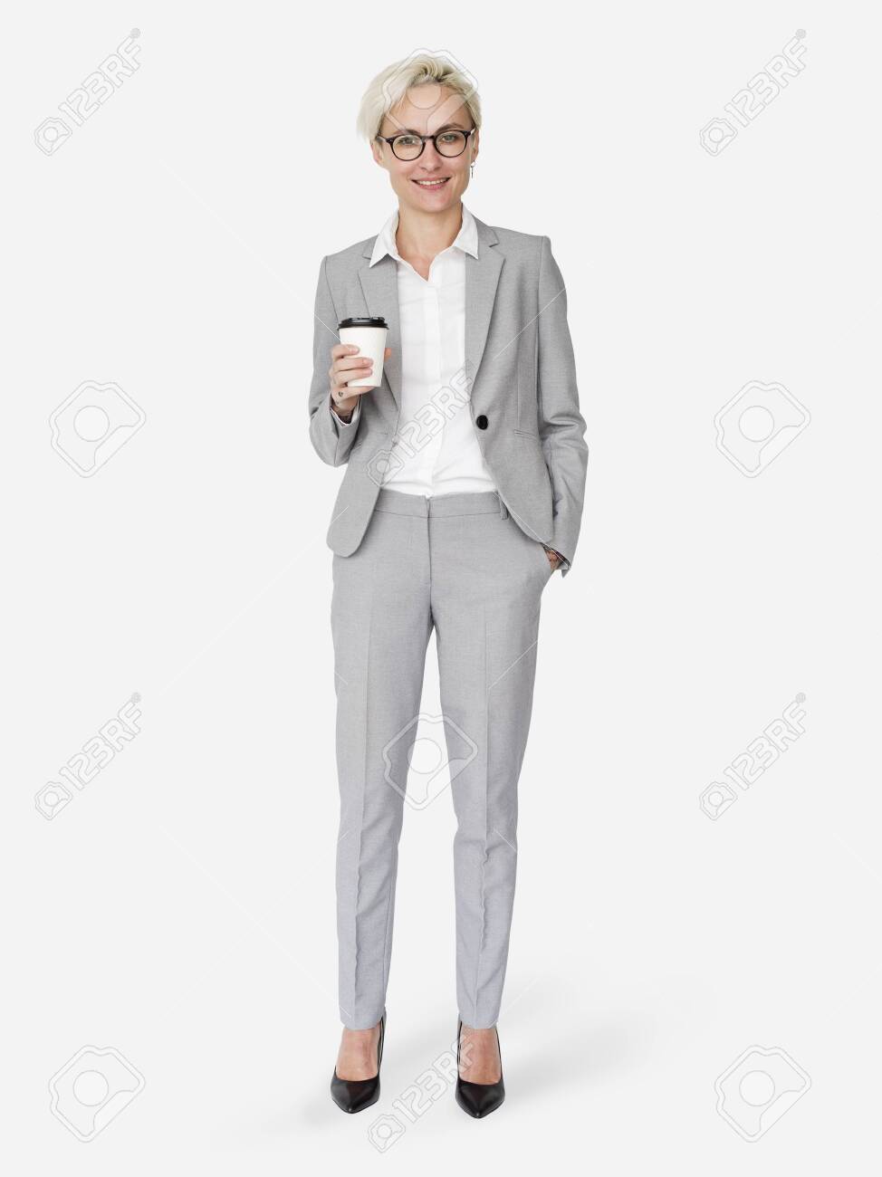 Cheerful businesswoman holding a coffee cup mockup character isolated on a white background - 122425354 Cheerful businesswoman holding a coffee cup mockup character isolated on a white background - 122425354