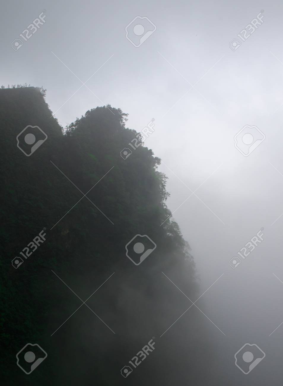 Photo Of Huge Rock Mountain Silhouette With White Mist Epic Stock Photo Picture And Royalty Free Image Image 71315223