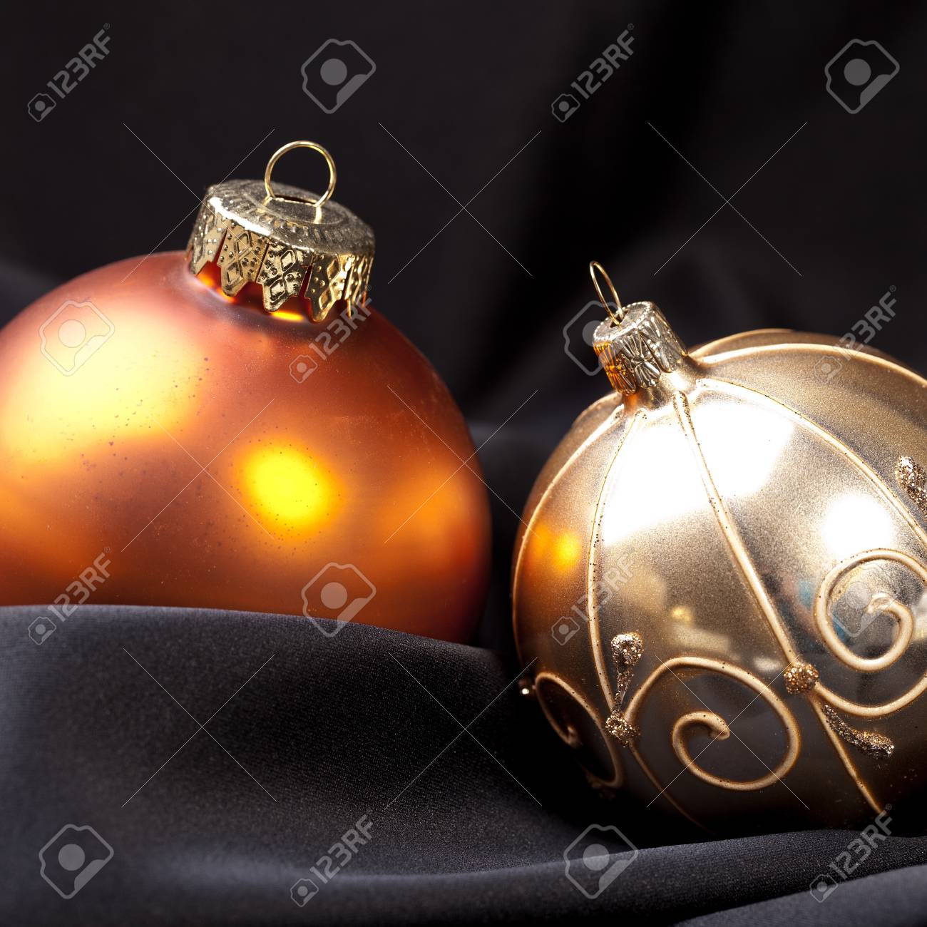two golden christmas balls on silk stock photo picture and royalty silk christmas balls