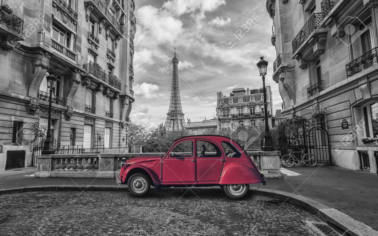 Eiffel tower in Paris and red retro car in black and white color key - 90104568 Eiffel tower in Paris and red retro car in black and white color key - 90104568
